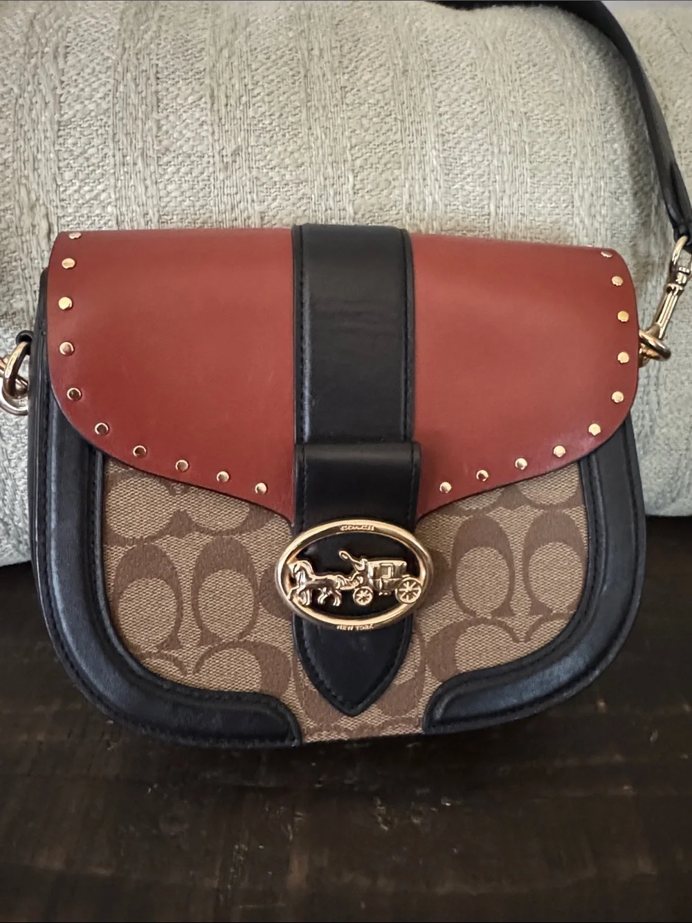 Coach Two-Tone Signature Saddle Crossbody — Rust Red, Black, and Tan